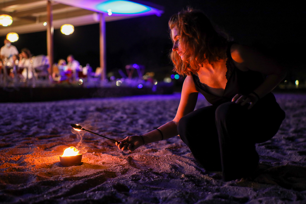 Fire show performance at Beach Restaurant & Bar Mareta 